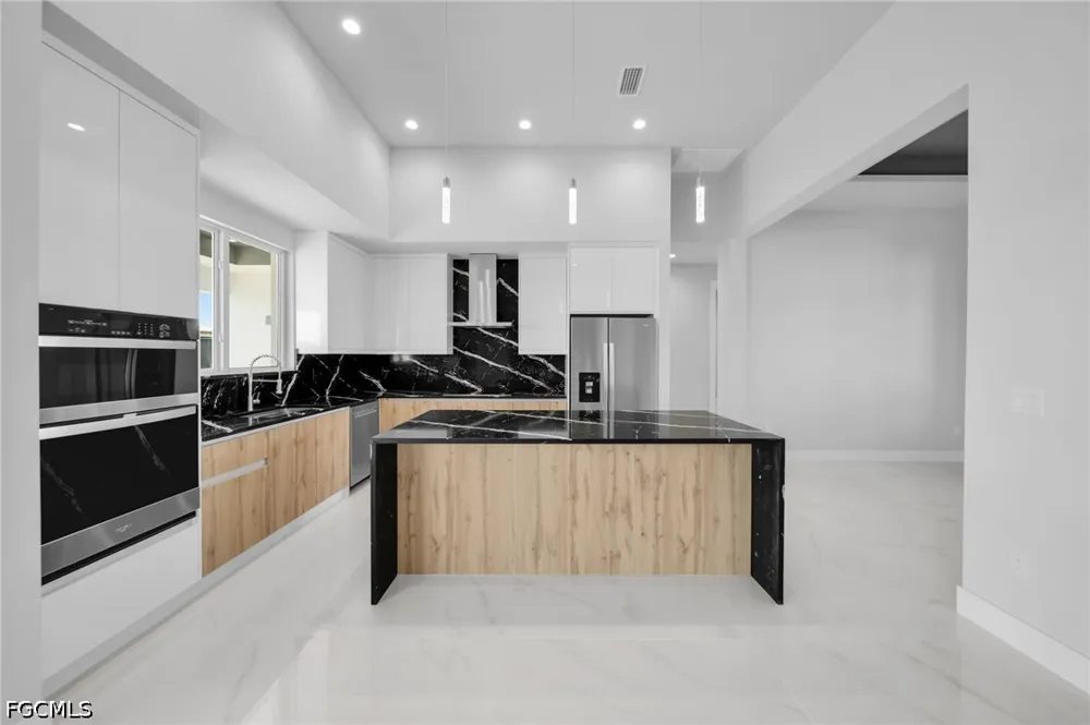 NW 40th Place Cape Coral, FL 33993