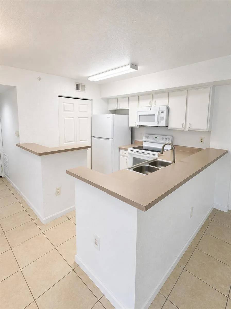 121 SW PALM DRIVE #104 Port St. Lucie, FL 34986