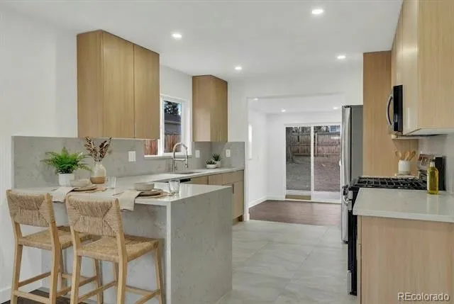 1551 W Hoye Place Denver, CO 80223