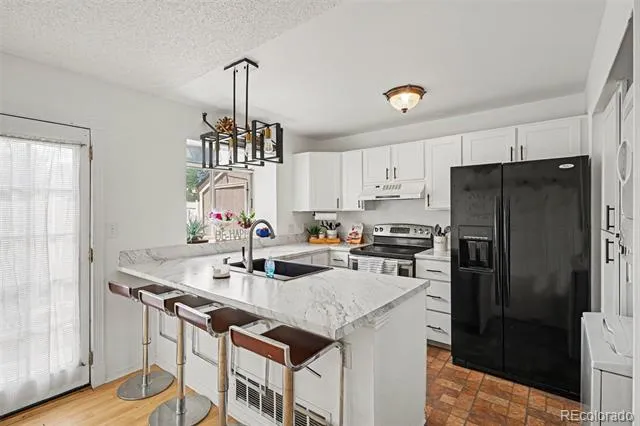 9715 W Chatfield Avenue #E Littleton, CO 80128