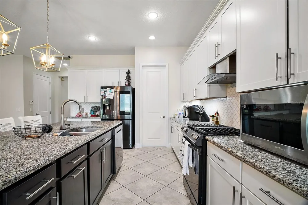 9153 CARMELA AVENUE Davenport, FL 33897