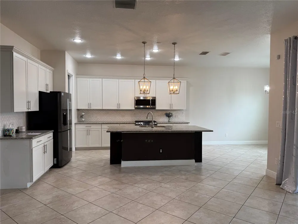 9153 CARMELA AVENUE Davenport, FL 33897