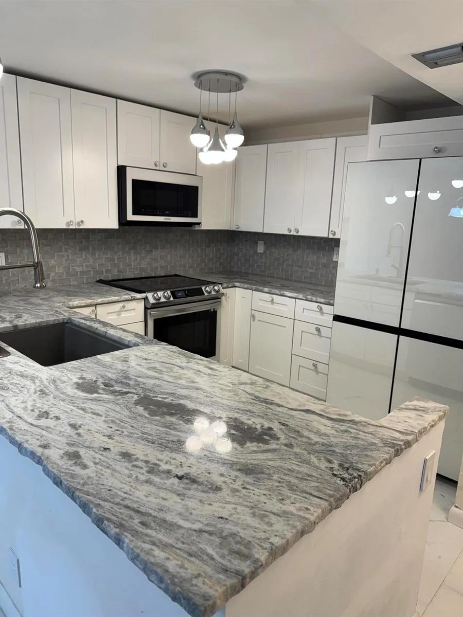 437 Golden Isles Drive #14 j Hallandale Beach, FL 33009