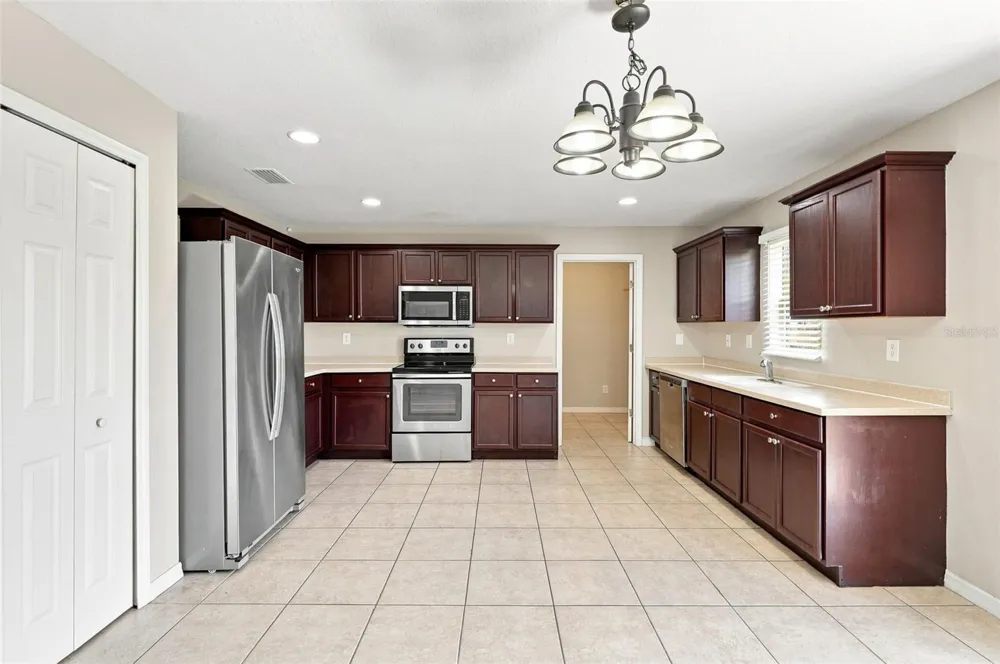 5123 CELLO WOOD LANE Wesley Chapel, FL 33543