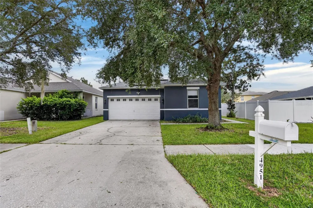 4951 WHISTLING PINES COURT Wesley Chapel, FL 33545