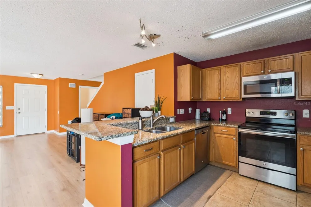 14445 CHINESE ELM DRIVE Orlando, FL 32828