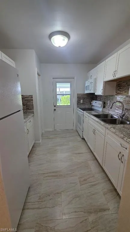 36 Pinewood Boulevard Lehigh Acres, FL 33936