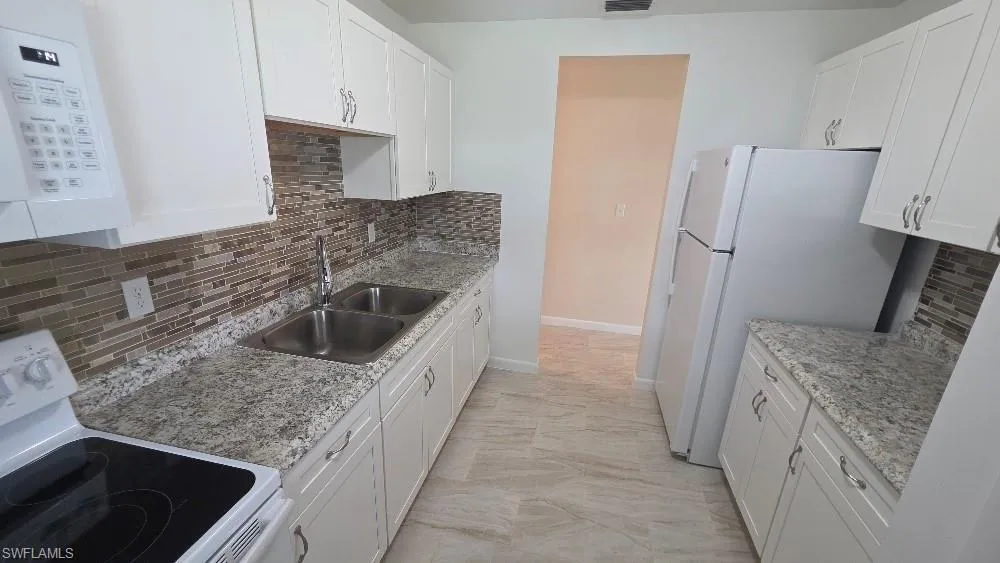36 Pinewood Boulevard Lehigh Acres, FL 33936
