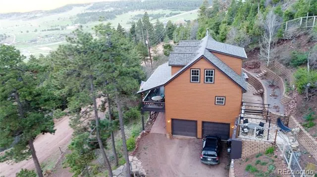 13558 Woodmoor West Drive Larkspur, CO 80118