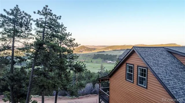 13558 Woodmoor West Drive Larkspur, CO 80118