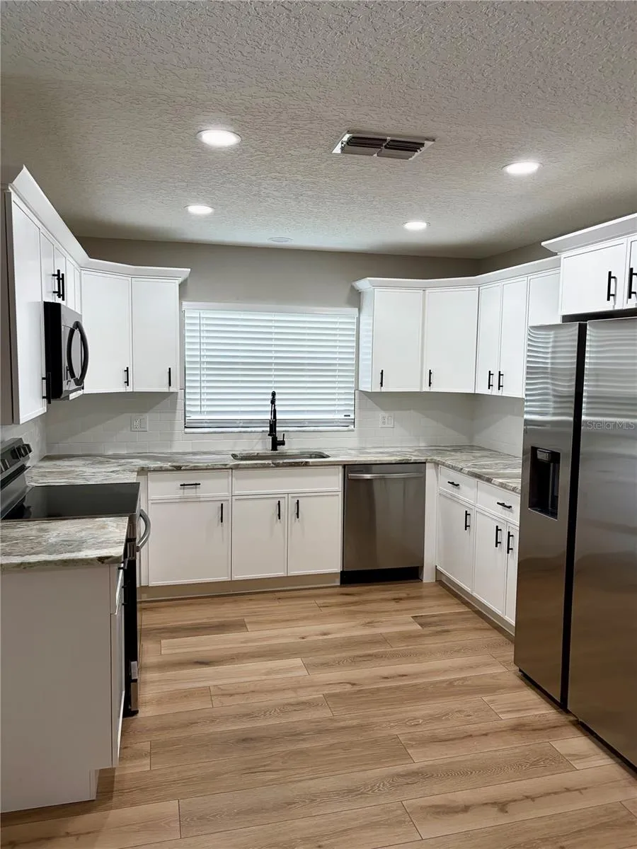 1202 MANDARIN DRIVE Holiday, FL 34691