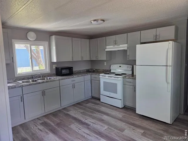 101 Larch Drive Log Lane Village, CO 80705