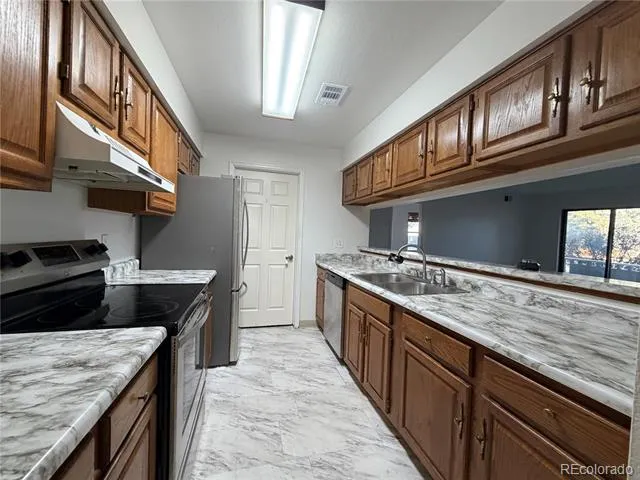 12043 W Cross Drive #107 Littleton, CO 80127