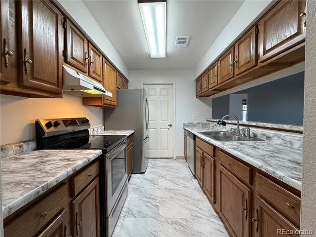 12043 W Cross Drive #107 Littleton, CO 80127