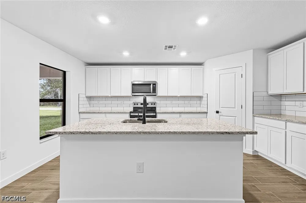 NW 26th Place Cape Coral, FL 33993