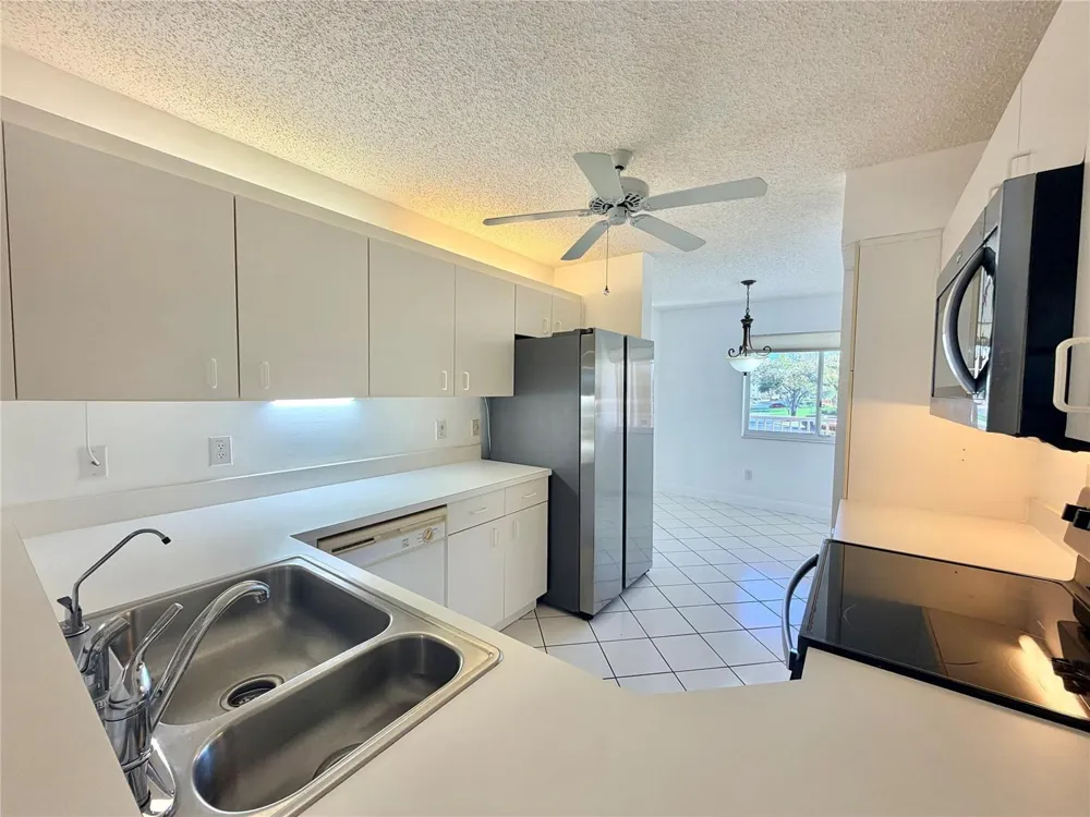 9587 WELDON CIRCLE #B204 Tamarac, FL 33321
