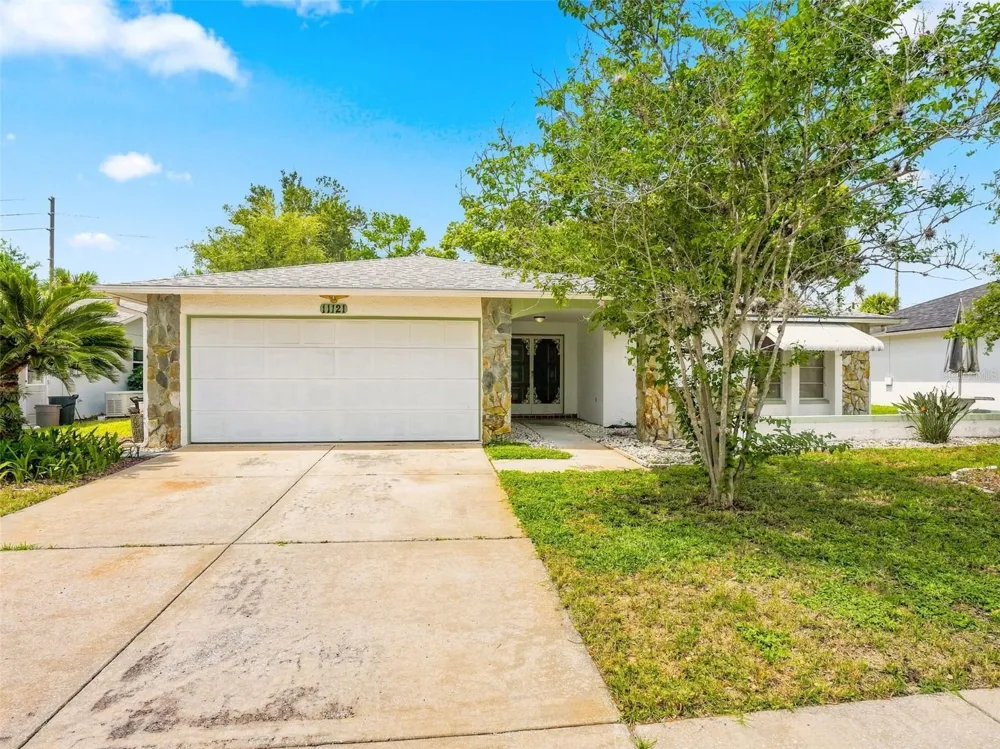 11121 ROLLINGWOOD DRIVE Port Richey, FL 34668