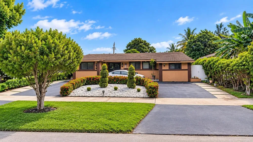 70 NE 174TH DRIVE North Miami Beach, FL 33162