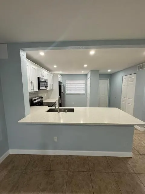 701 Palm Beach Trace Drive Royal Palm Beach, FL 33411