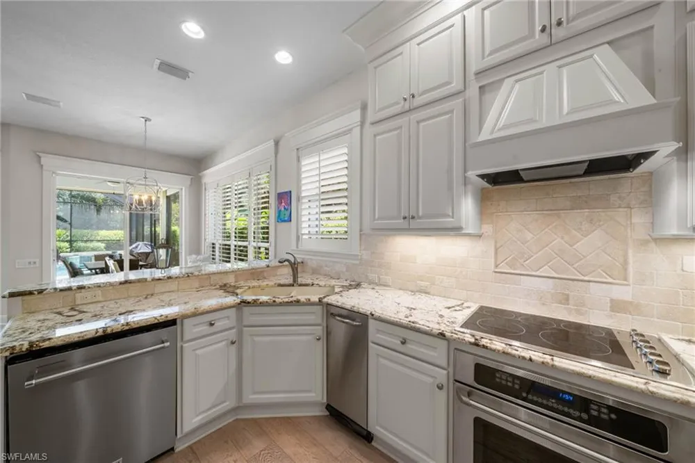 9296 Troon Lakes Drive Naples, FL 34109