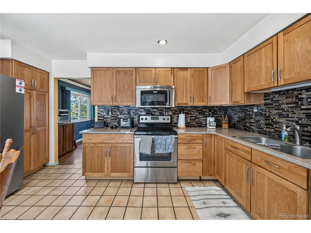 990 Saddleback Drive Evergreen, CO 80439