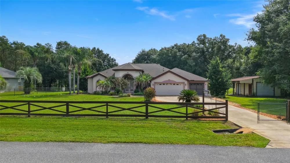 7716 PINE LANDS DRIVE Wesley Chapel, FL 33544