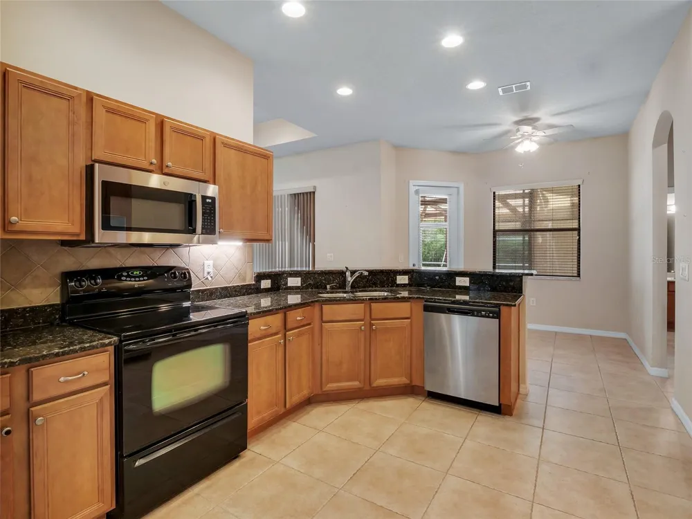7716 PINE LANDS DRIVE Wesley Chapel, FL 33544