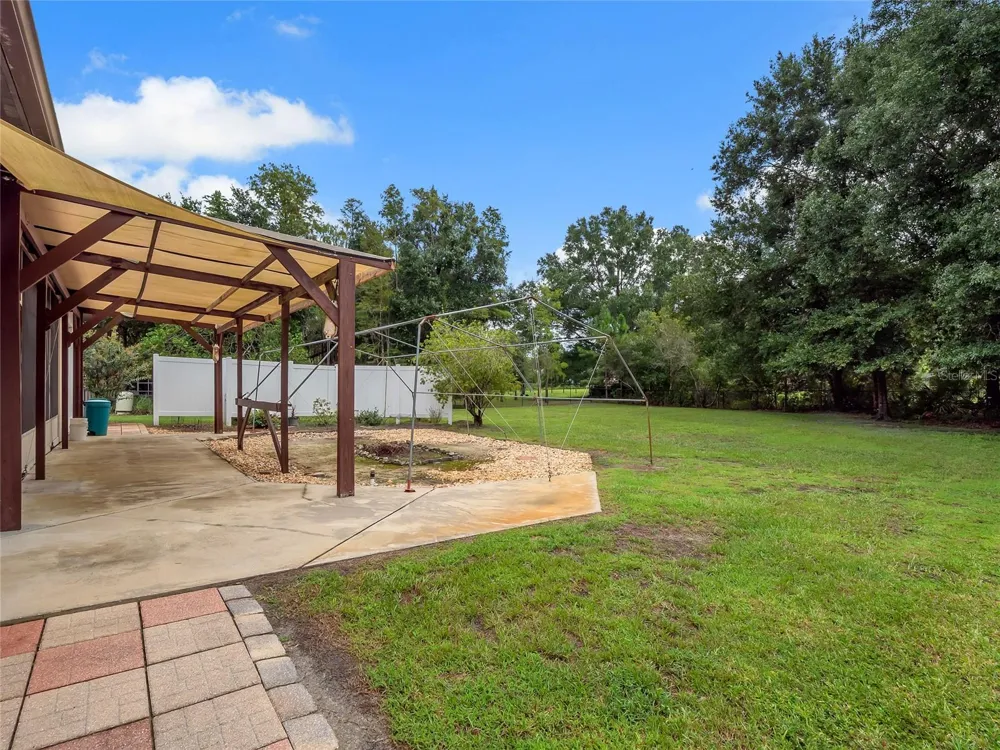 7716 PINE LANDS DRIVE Wesley Chapel, FL 33544
