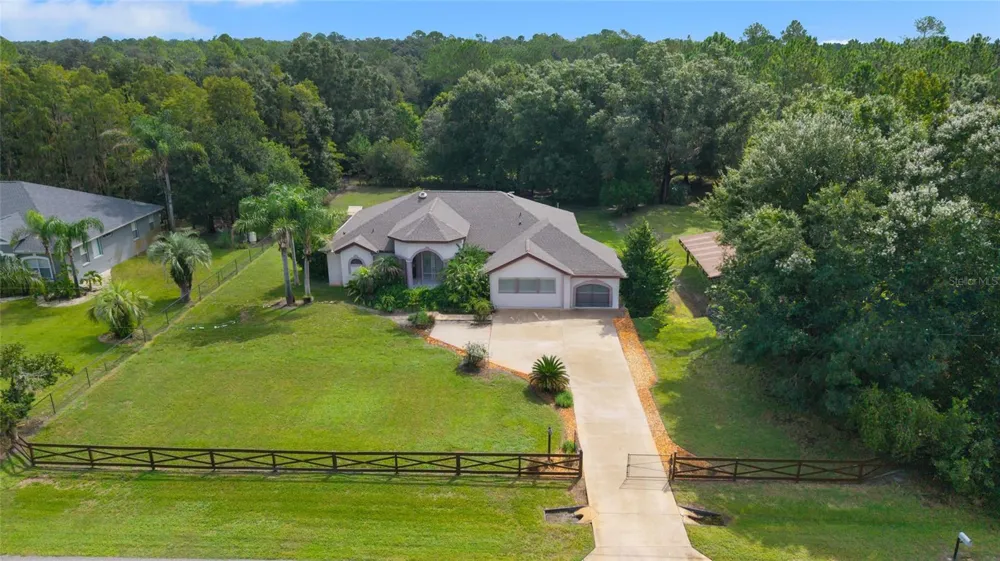 7716 PINE LANDS DRIVE Wesley Chapel, FL 33544