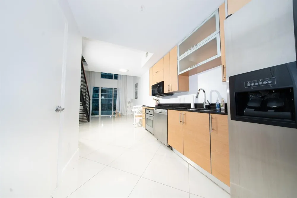 60 SW 13TH STREET #1418 Miami, FL 33130