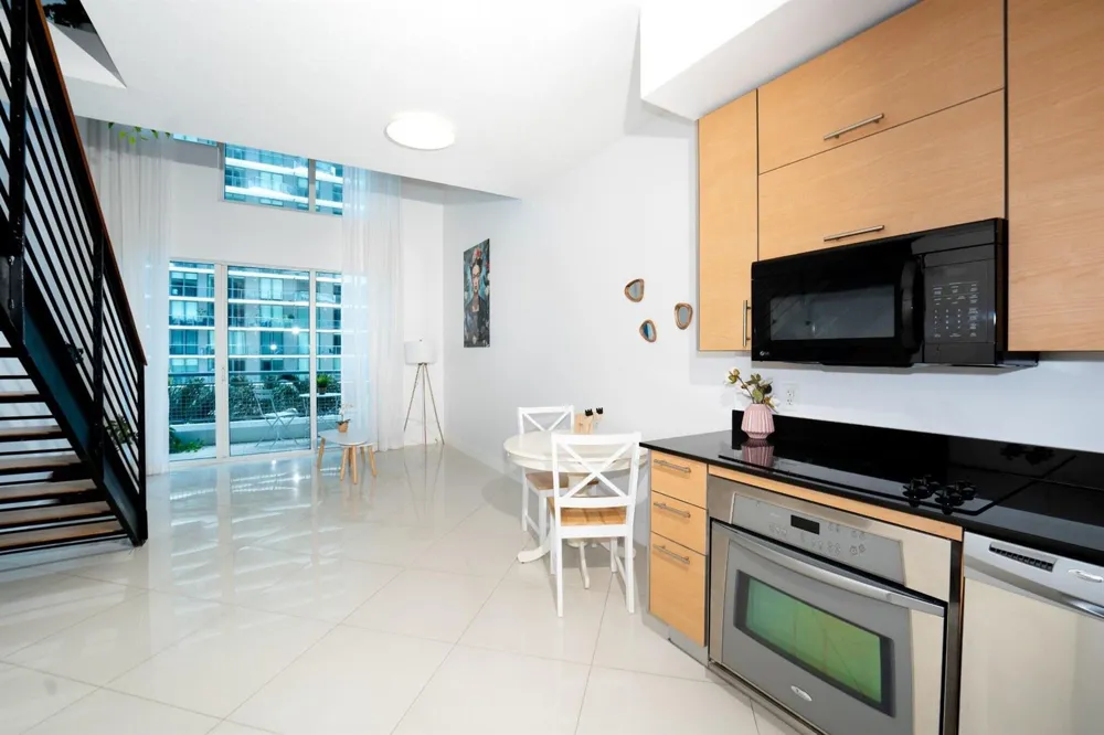 60 SW 13TH STREET #1418 Miami, FL 33130