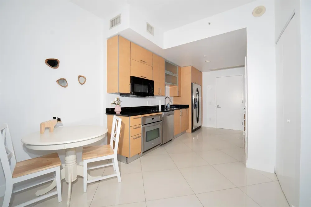 60 SW 13TH STREET #1418 Miami, FL 33130