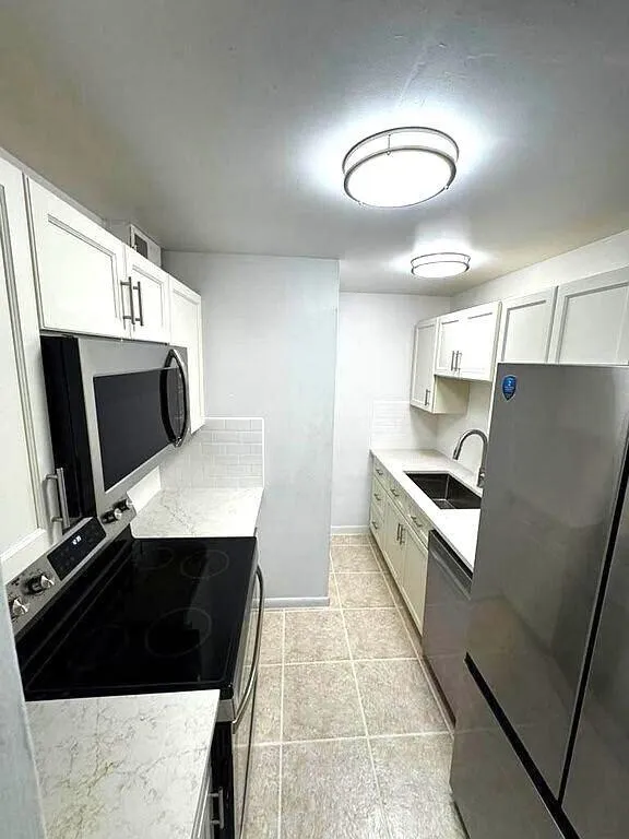 1020 CRYSTAL LAKE DRIVE #103 Deerfield Beach, FL 33064