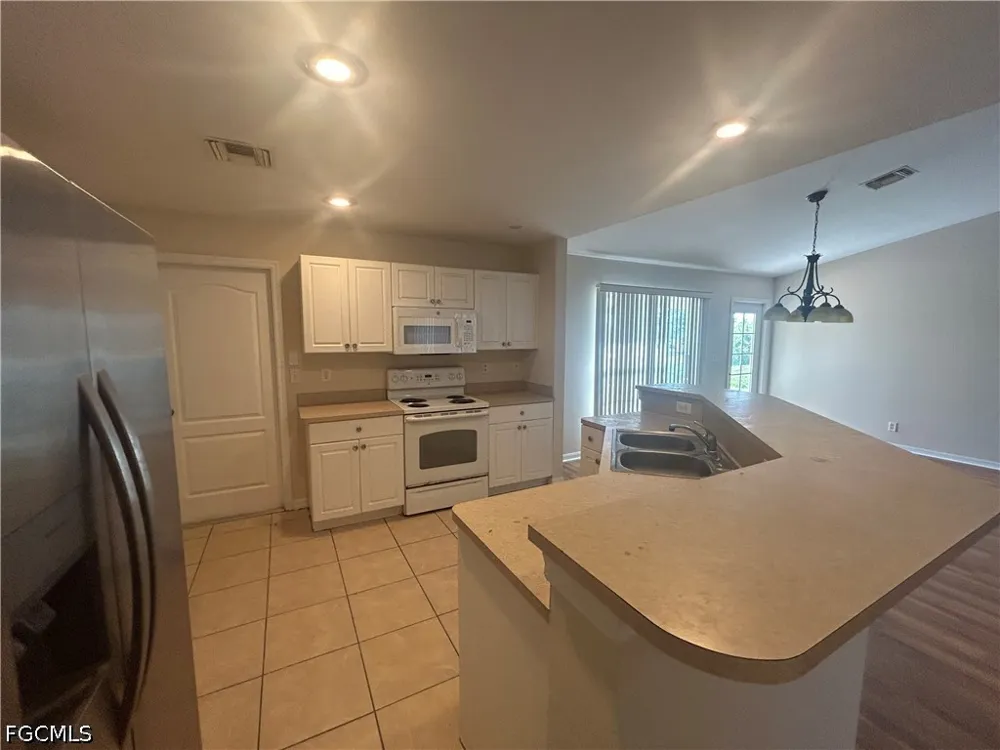 NE 12th Court Cape Coral, FL 33909