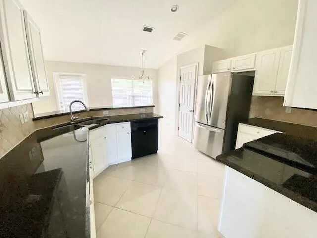 598 NW KINGSTON STREET Port St. Lucie, FL 34983