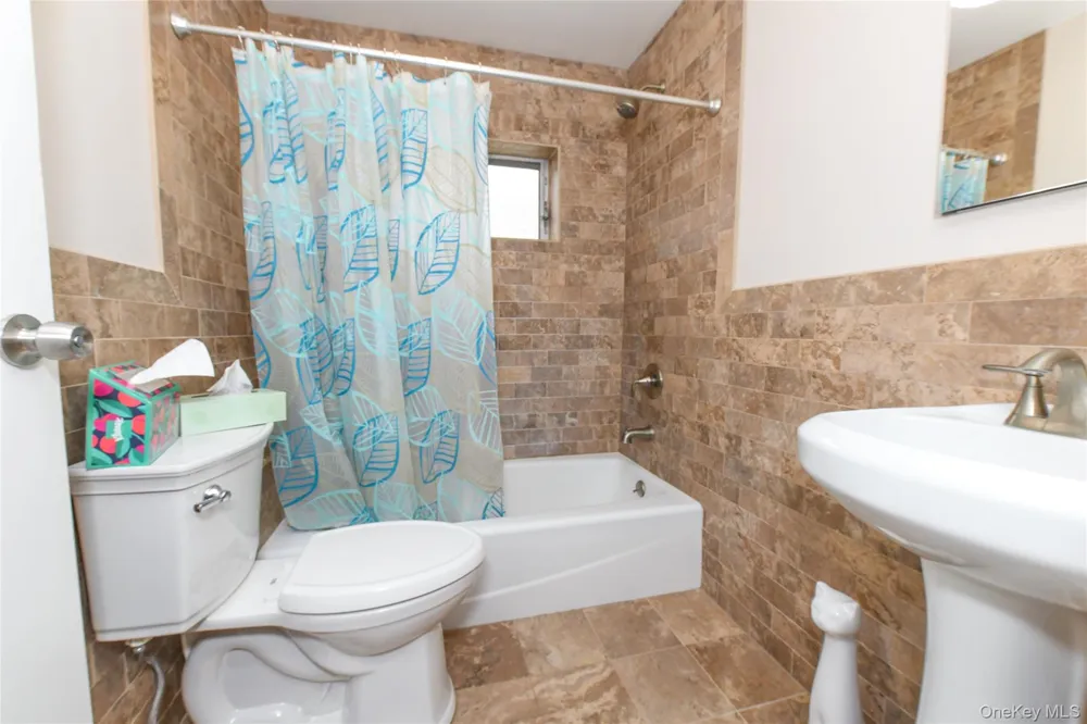 85-11 Sutter Avenue Ozone Park, NY 11417