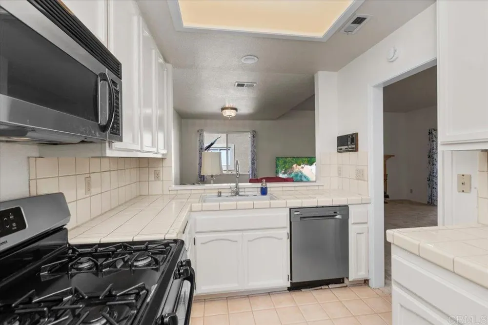 7758 Caminito Monarca #111 Carlsbad, CA 92009