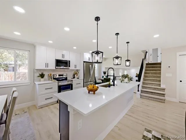 8937 W Woodard Drive Denver, CO 80227