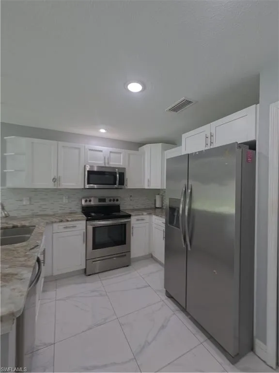 131 Gilbert Avenue S Lehigh Acres, FL 33973