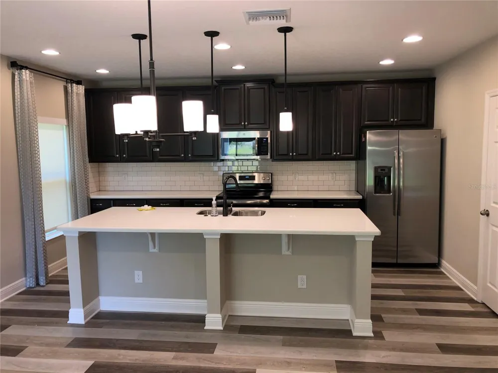 5512 WINDSONG OAK DRIVE Leesburg, FL 34748
