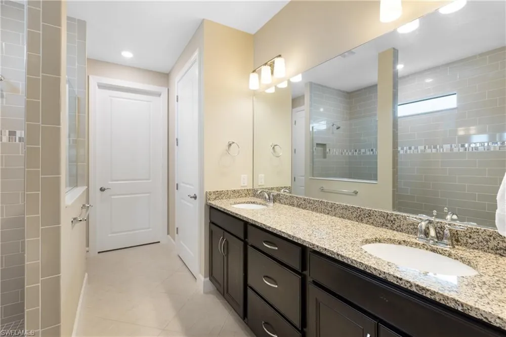 7700 Winding Cypress Drive Naples, FL 34114