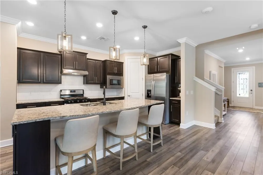 7700 Winding Cypress Drive Naples, FL 34114