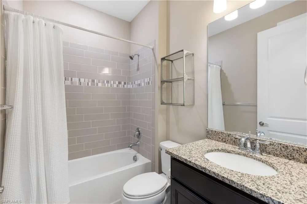 7700 Winding Cypress Drive Naples, FL 34114