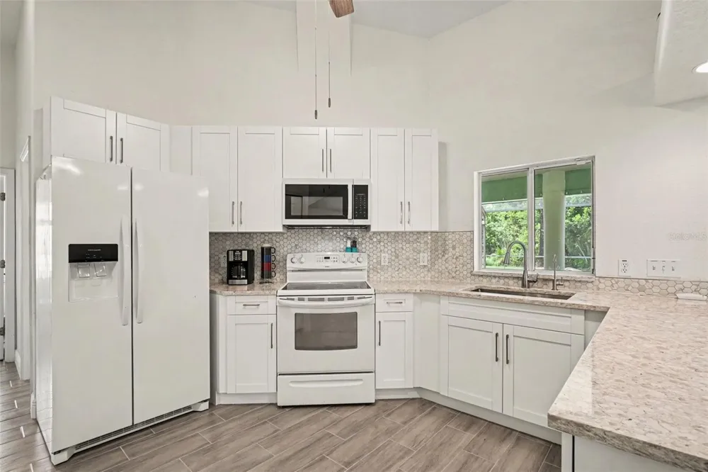 405 POINSETTIA AVENUE Lehigh Acres, FL 33972