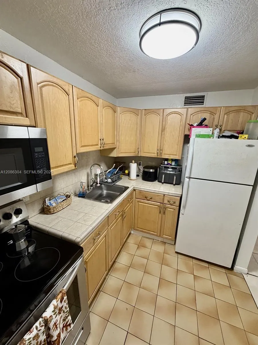 8095 NW 8th St #402 Miami, FL 33126