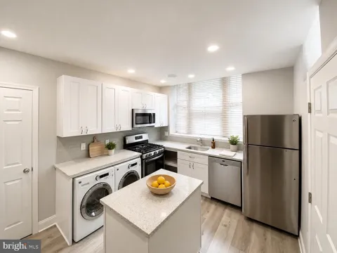 2133 DELANCEY PLACE #1S