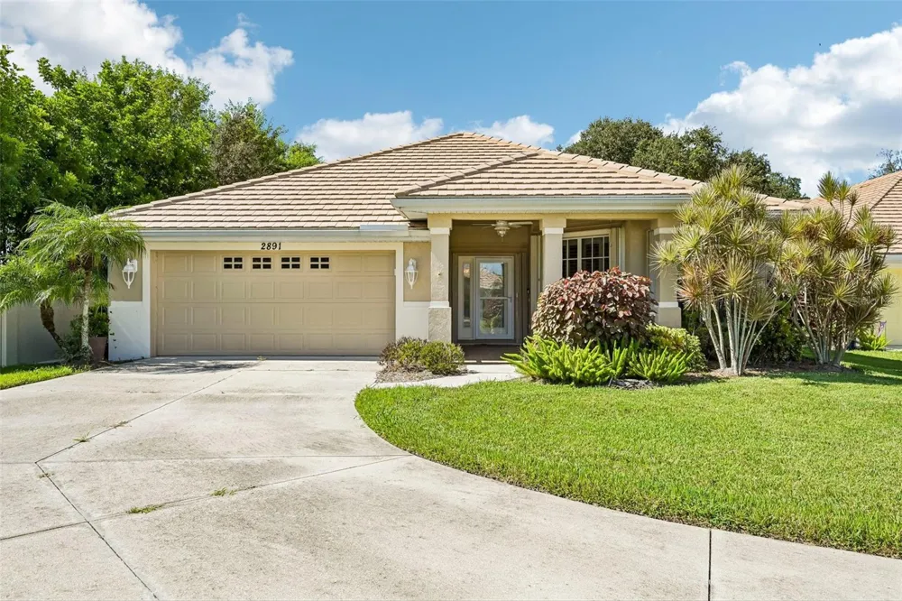 2891 WHISPERING PINE LANE North Port, FL 34287