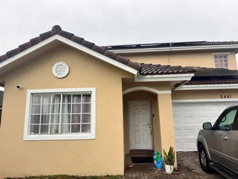 2441 NW 14TH COURT