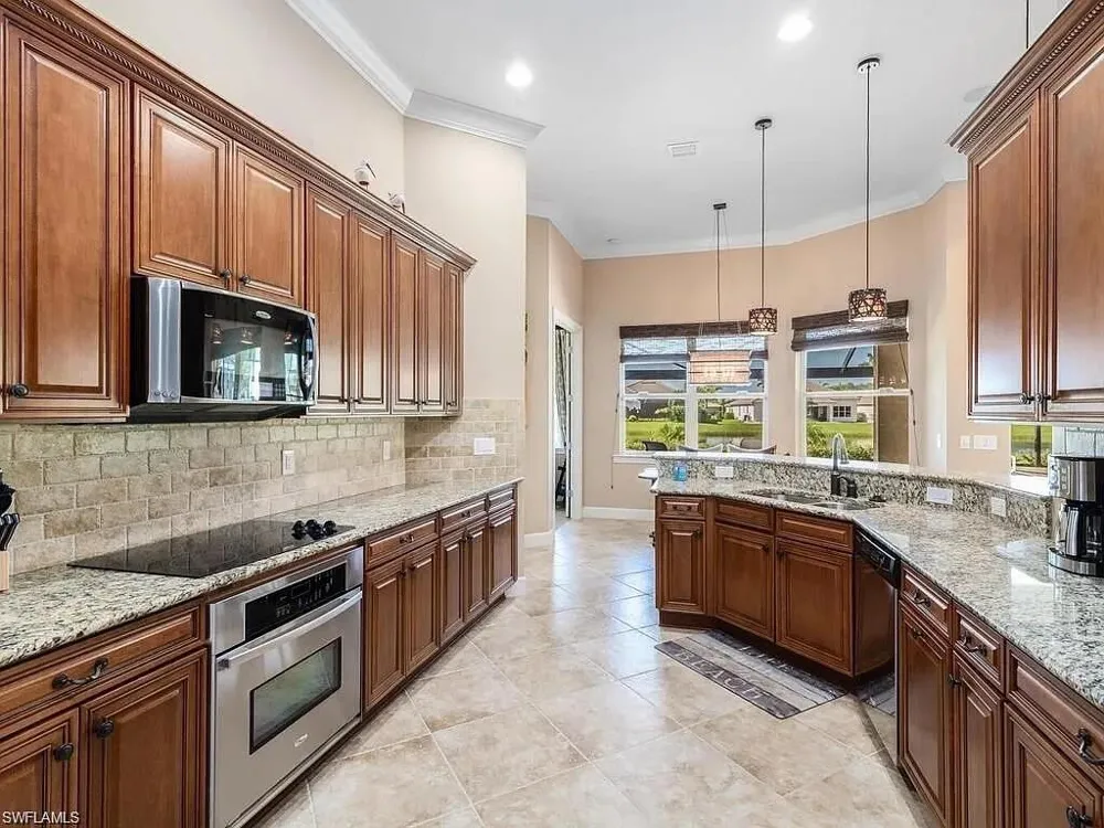 9392 Copper Rock Court Naples, FL 34120