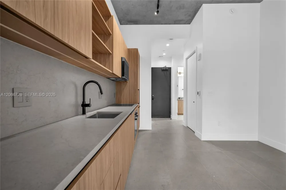 91 NW 27th St #403 Miami, FL 33127